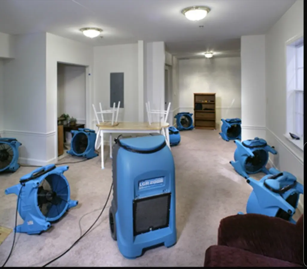 Air movers and dehumidifier setup for Water Damage Restoration in Gladewater